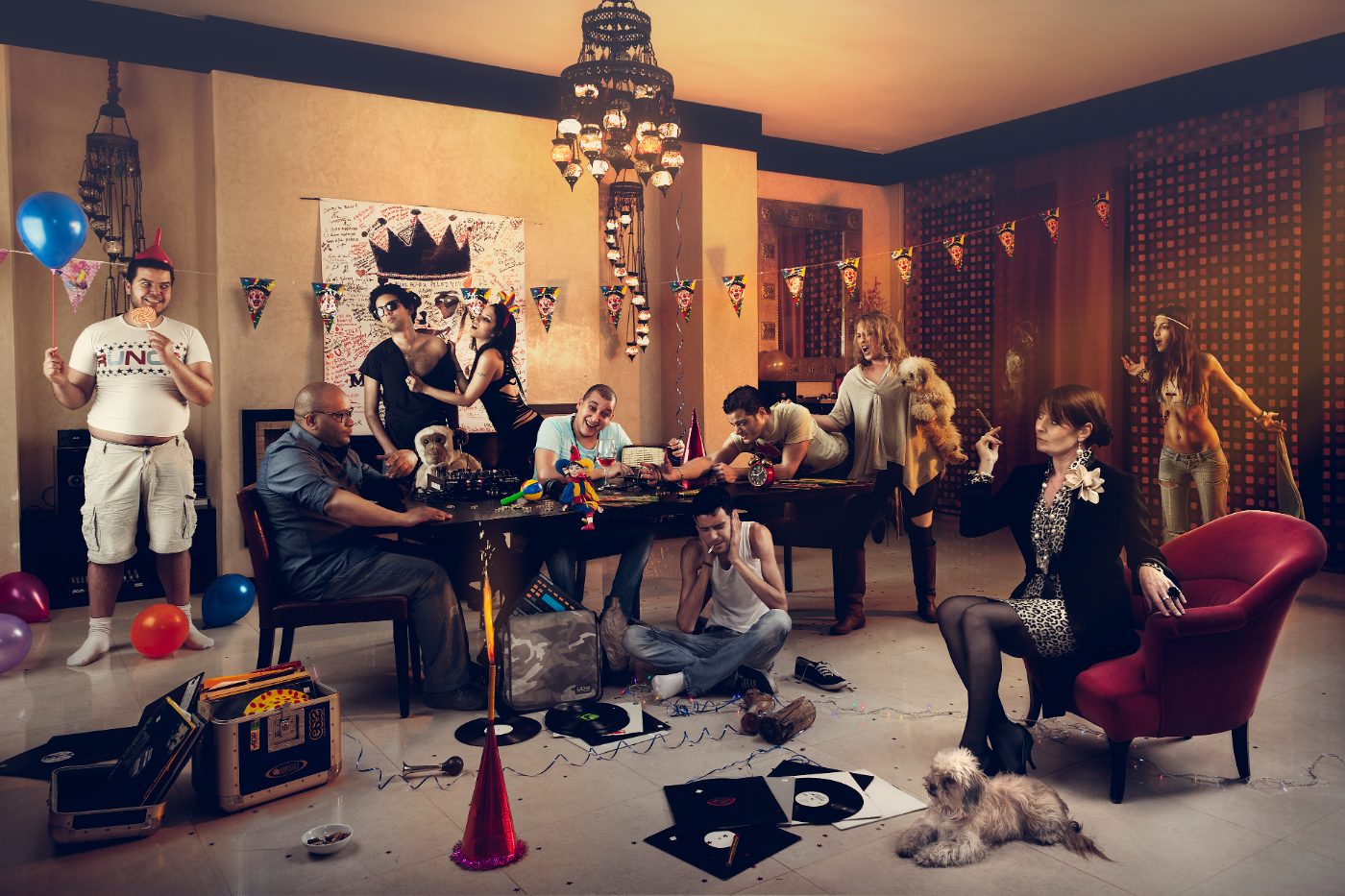 The collective staged as a family: a room mid-party, twelve of them held in place